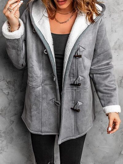 Full Size Pocketed Long Sleeve Hooded Toggle Jacket – Stylish & Functional Outerwear for Women Stevvex