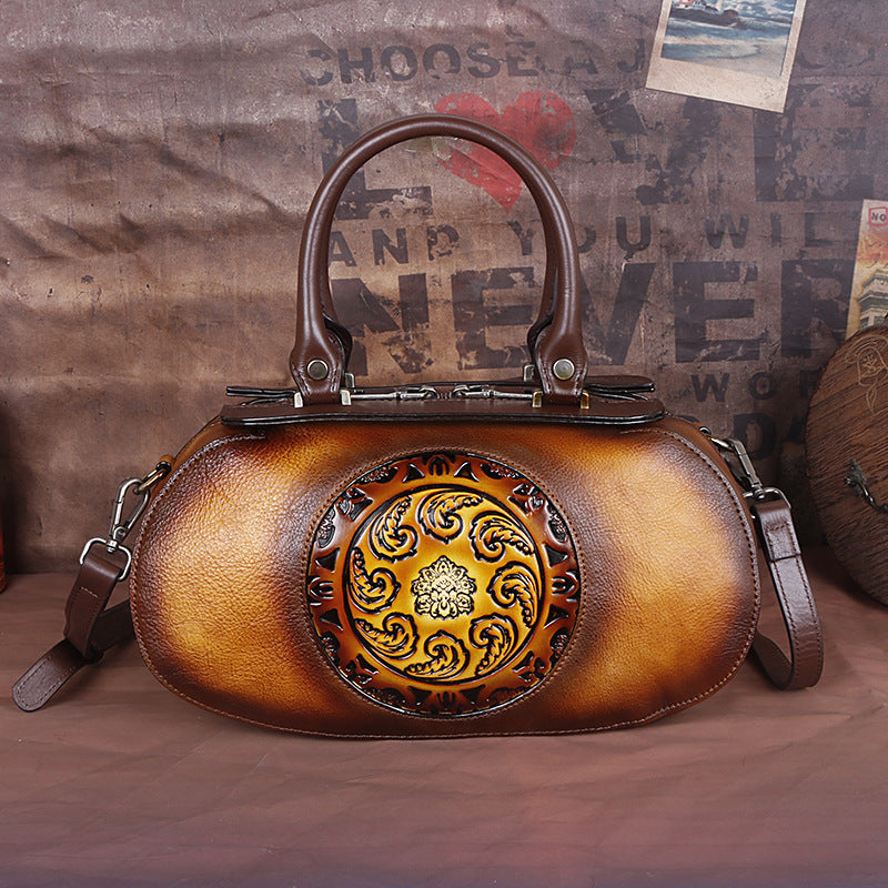 Cowhide diagonal handbag