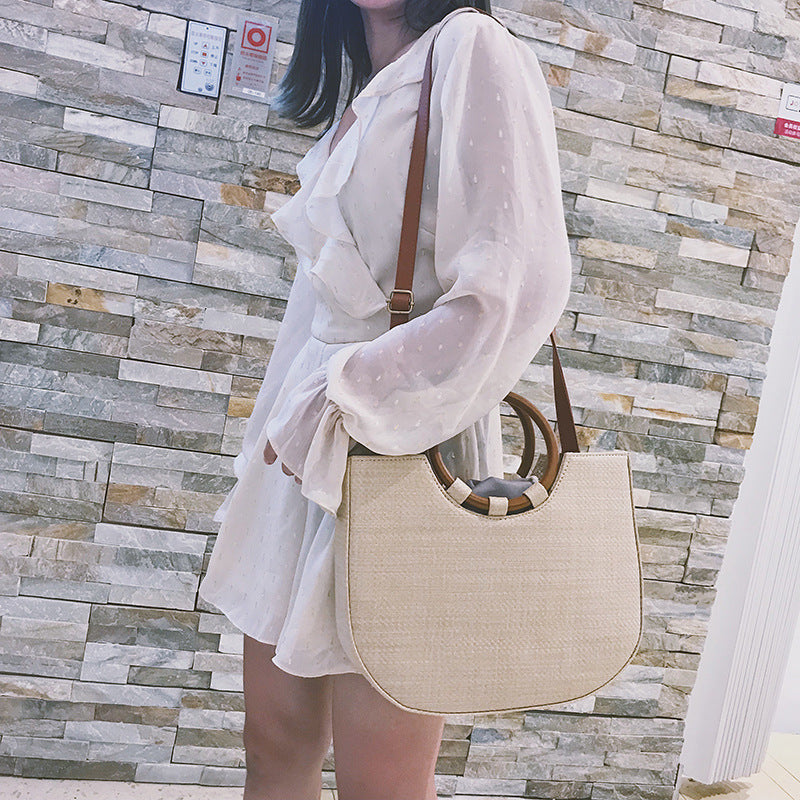 Straw handbag with wooden handle Pi-Mart