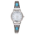 Time and Tru Adult Analog Watch in a Silvertone Round Case with Turquoise Band (WML2003WM1)