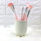 Embossed makeup brush tube