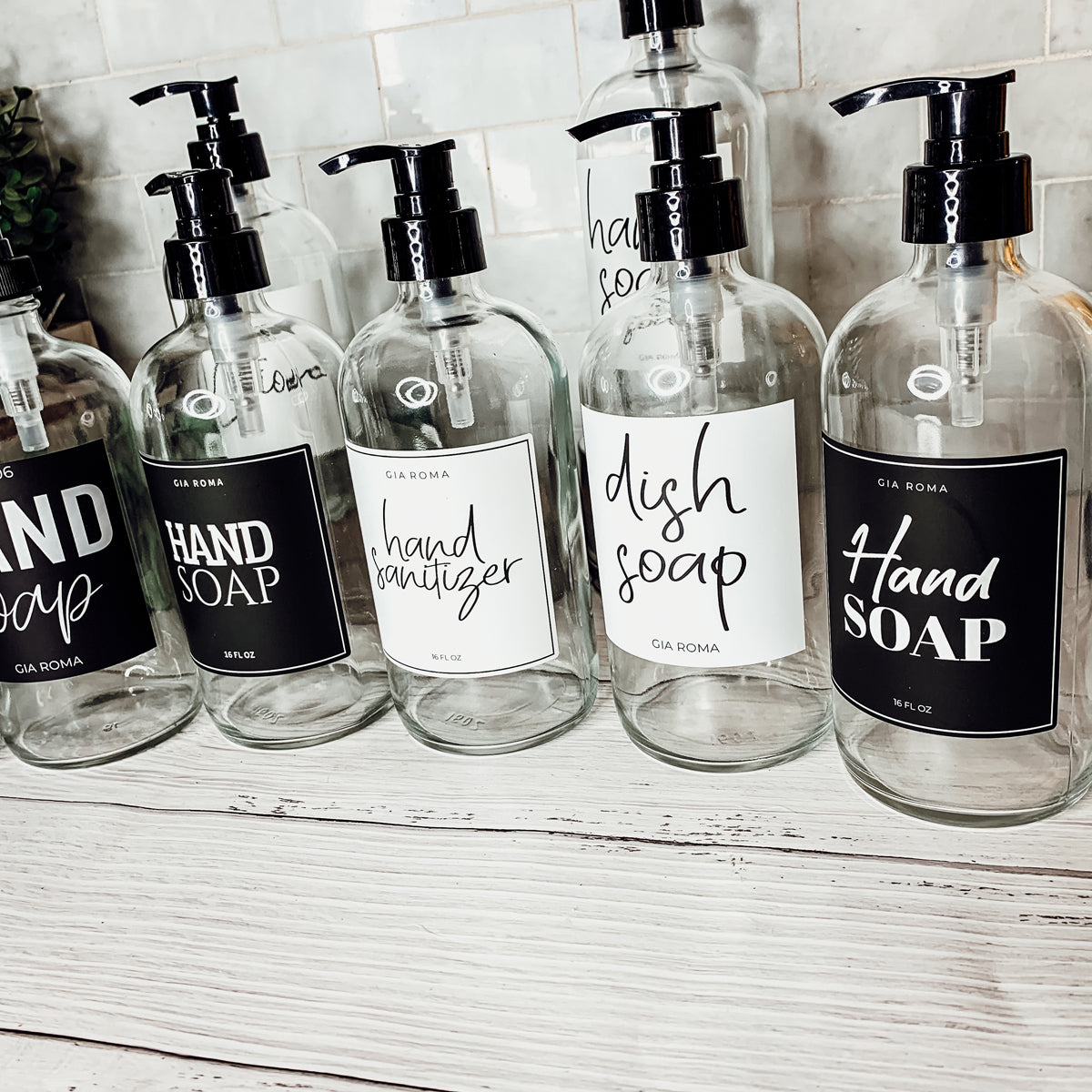 16oz Clear Glass Soap Bottle Refillable Boston Round With Black Label BandsCo Straps