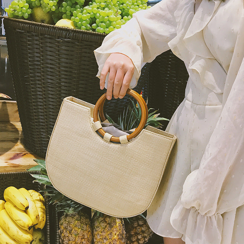 Straw handbag with wooden handle Pi-Mart