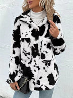 Trendy Black White Cozy Cow Print Collared Neck Button Up Fuzzy Jacket Modern & Warm Outerwear Stevvex