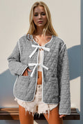 Charming Double Take Contrast Trim Tie Front Quilted Jacket with Pockets Elegant & Cozy Outerwear Stevvex