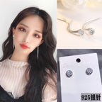 Single diamond tassel earring