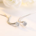 Single diamond tassel earring