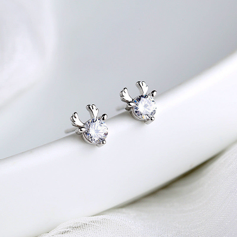 Single diamond deer earring Pi-Mart