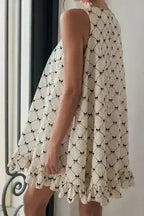 Ruffled Hem Bow Print Sleeveless Mini Dress
