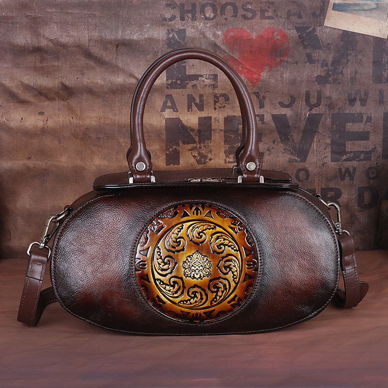 Cowhide diagonal handbag