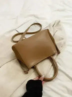 Stylish Suede Handbag – Adjustable Strap & Dual-Use Design