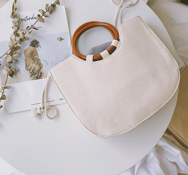Straw handbag with wooden handle Pi-Mart
