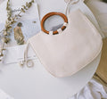 Straw handbag with wooden handle Pi-Mart