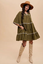 Tassel Contrast Trim Tie Neck Half Sleeve Tiered Dress – Bohemian Tassel Details, Contrast Trim, and Tiered Design for a Flowing, Feminine Look