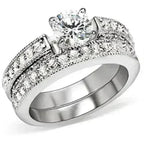 5X016 Rhodium Brass Ring – 6.5mm AAA Clear CZ Solitaire (Bold & Brilliant)