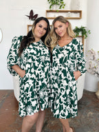 Double Take Full Size Printed Ruffle Hem Dress with Pocket Stylish & Functional Women Dress
