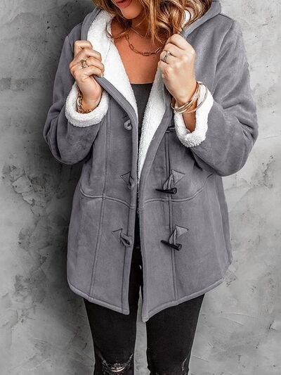 Full Size Pocketed Long Sleeve Hooded Toggle Jacket – Stylish & Functional Outerwear for Women Stevvex