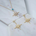 Petite Star Burst Drop Earrings | Gold CZ Celestial Jewelry - Femstylo