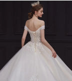 Luxury Off-Shoulder Wedding Dress - Handmade Lace Ball Gown | Femstylo