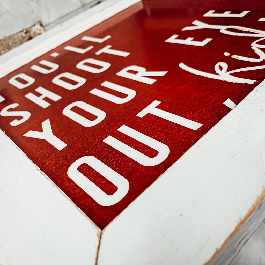 You'll Shoot Your Eye Out Sign - A Christmas Story Holiday Movie Quote Decor BandsCo Straps