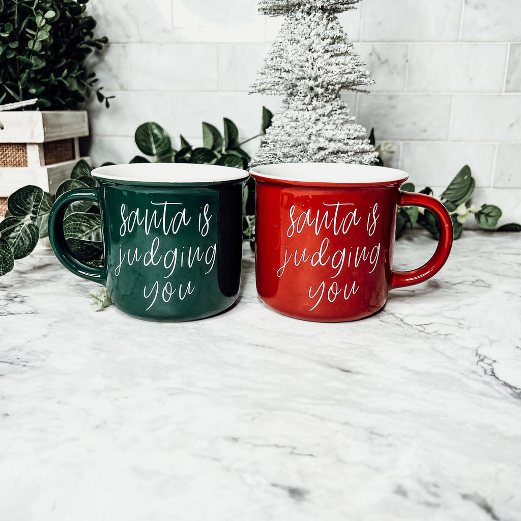 Santa Is Judging Mug 14.5oz Ceramic Campfire Style Holiday Coffee Mug Red Or Green Double Sided BandsCo Straps