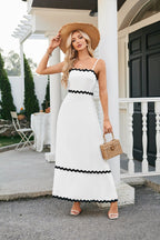 Women's long sleeveless dress with suspenders and pleated lace