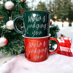 Santa Is Judging Mug 14.5oz Ceramic Campfire Style Holiday Coffee Mug Red Or Green Double Sided BandsCo Straps