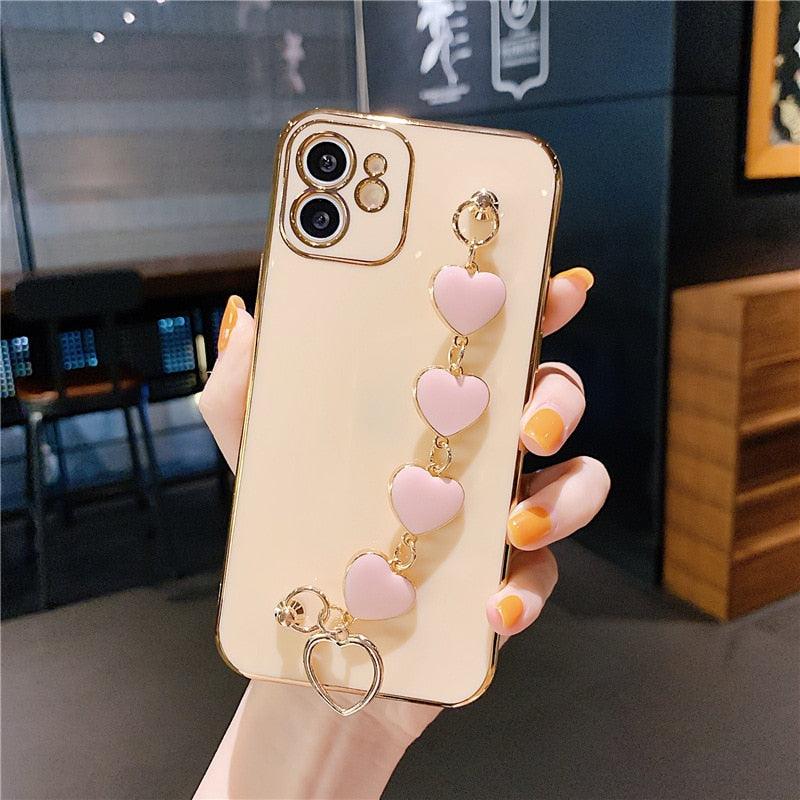 Luxury Women Silicone Phone Case Cover With Wrist Chain Bracelet for iPhone  Wristband Bracelet Hand Holder Cover for iPhone 13 12 11 Pro Max plating Case Heart Chain Cases for iPhone 7 8 Plus XR XS Max X Stevvex