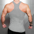 FlexFit Cotton Sleeveless Muscle Tank - Irregular Hem THRIXINE