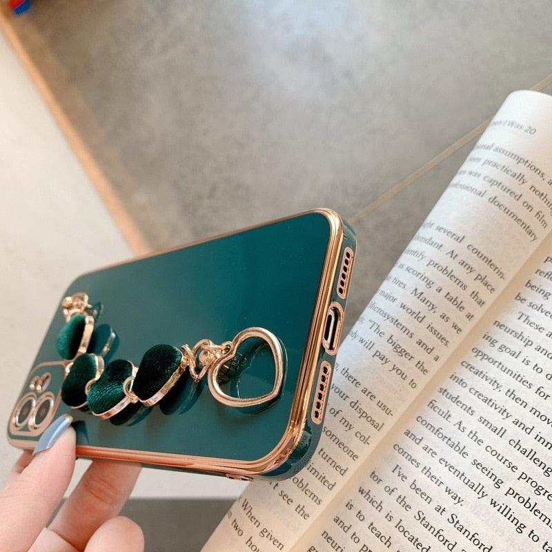 Luxury Women Silicone Phone Case Cover With Wrist Chain Bracelet for iPhone  Wristband Bracelet Hand Holder Cover for iPhone 13 12 11 Pro Max plating Case Heart Chain Cases for iPhone 7 8 Plus XR XS Max X Stevvex
