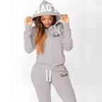 ChicStride: Women's Striped Hoodie & Jogger Set THRIXINE