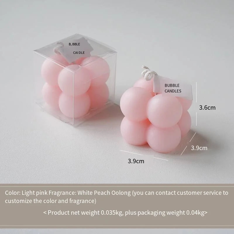 A square ball-shaped scented candle, a colorful birthday gift, a handcrafted candle, and a cute-shaped scented candle Lootquake LLC