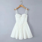 YENKYE Sexy Elegant Women Hollow Out Embroidery Yellow Sling Mini Dress Low Waist Lace Up Bandage Party Dresses Birthday Robe