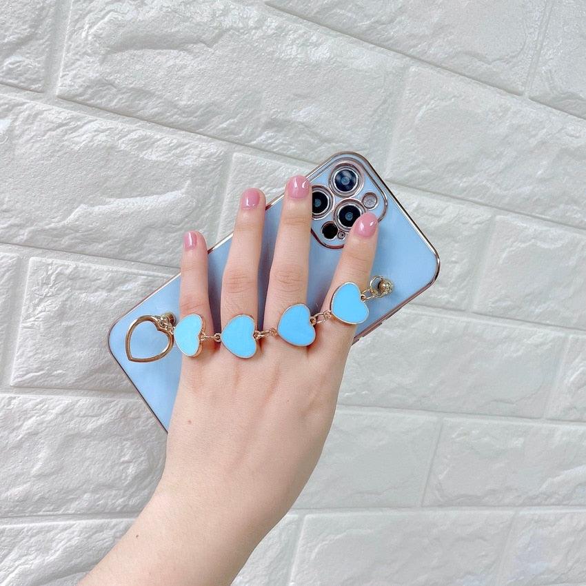 Luxury Women Silicone Phone Case Cover With Wrist Chain Bracelet for iPhone  Wristband Bracelet Hand Holder Cover for iPhone 13 12 11 Pro Max plating Case Heart Chain Cases for iPhone 7 8 Plus XR XS Max X Stevvex