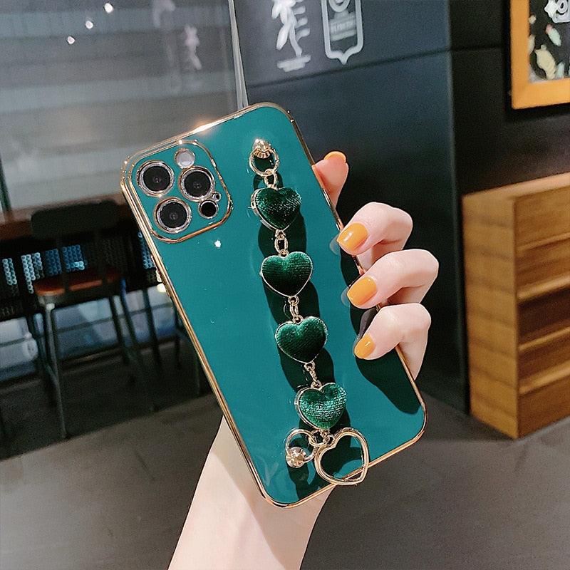 Luxury Women Silicone Phone Case Cover With Wrist Chain Bracelet for iPhone  Wristband Bracelet Hand Holder Cover for iPhone 13 12 11 Pro Max plating Case Heart Chain Cases for iPhone 7 8 Plus XR XS Max X Stevvex