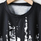 Boys' Summer Set: Cool Black & White Round-neck T-shirt with Slanted Pocket, Paired with Matching Shorts for Casual Play.