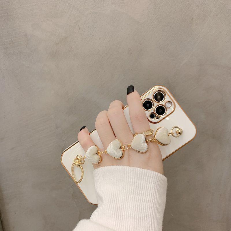 Luxury Women Silicone Phone Case Cover With Wrist Chain Bracelet for iPhone  Wristband Bracelet Hand Holder Cover for iPhone 13 12 11 Pro Max plating Case Heart Chain Cases for iPhone 7 8 Plus XR XS Max X Stevvex
