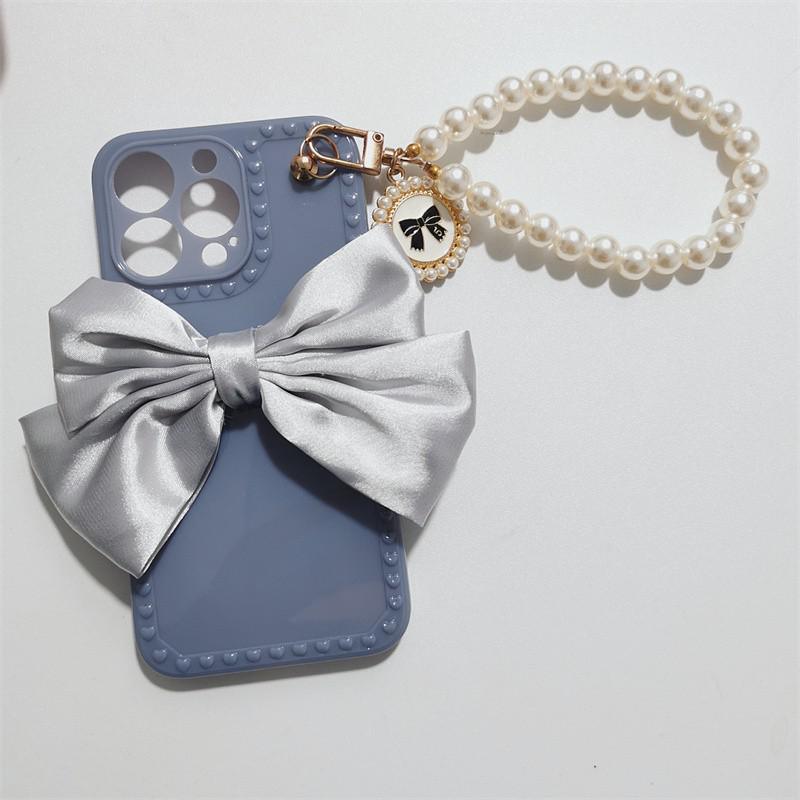 Cute Luxury Fashion 3d Bow Pearl Bracelet Girl Soft Case For iPhone 11 12 13 Pro Max 7 8 Plus Xr X Xs Se Anti-drop Cover Pearl Chain Bow Phone Case Ideal for iPhone Elegant Phone Case Stevvex