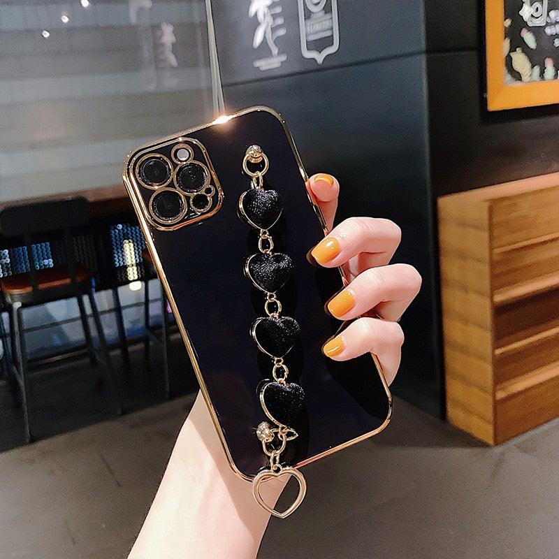 Luxury Women Silicone Phone Case Cover With Wrist Chain Bracelet for iPhone  Wristband Bracelet Hand Holder Cover for iPhone 13 12 11 Pro Max plating Case Heart Chain Cases for iPhone 7 8 Plus XR XS Max X Stevvex