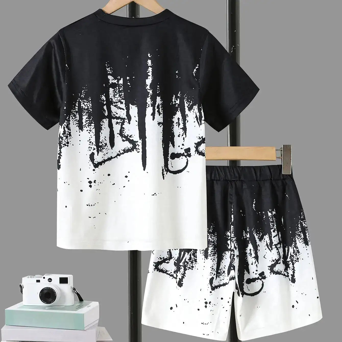Boys' Summer Set: Cool Black & White Round-neck T-shirt with Slanted Pocket, Paired with Matching Shorts for Casual Play.