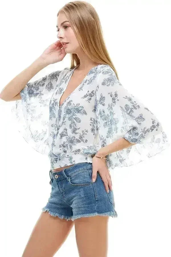 LONG SLEEVE SURPLICE FLORAL TOP | FEMSTYLO - SJB-DIAMOND ELITES