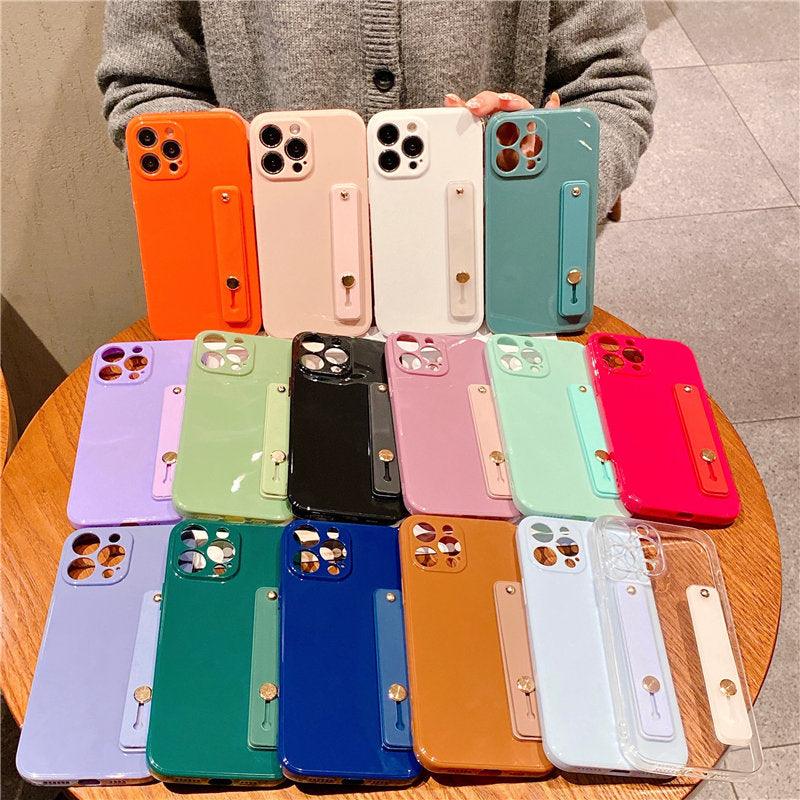 Adjustable Wrist Strap Stand Holder Case with Camera Protection Cute Solid Color Silicone Phone Case Phone Case For iPhone 13 14 Pro Max 12 11 XS Max XR 7 8 Plus 13Pro Soft Silicone Candy Color Back Cover Stevvex