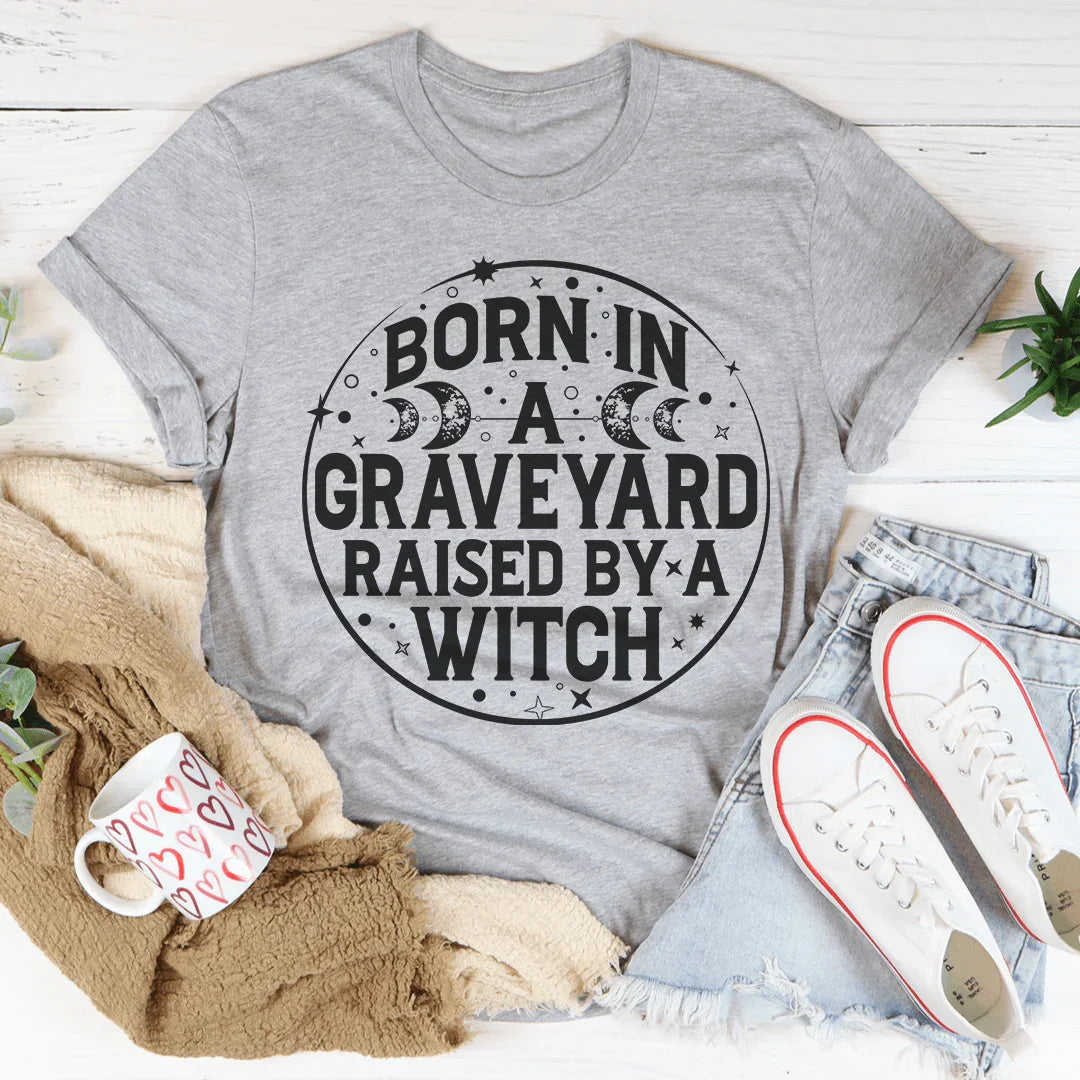 Born In A Graveyard Raised By A Witch Tee Peachy Sunday