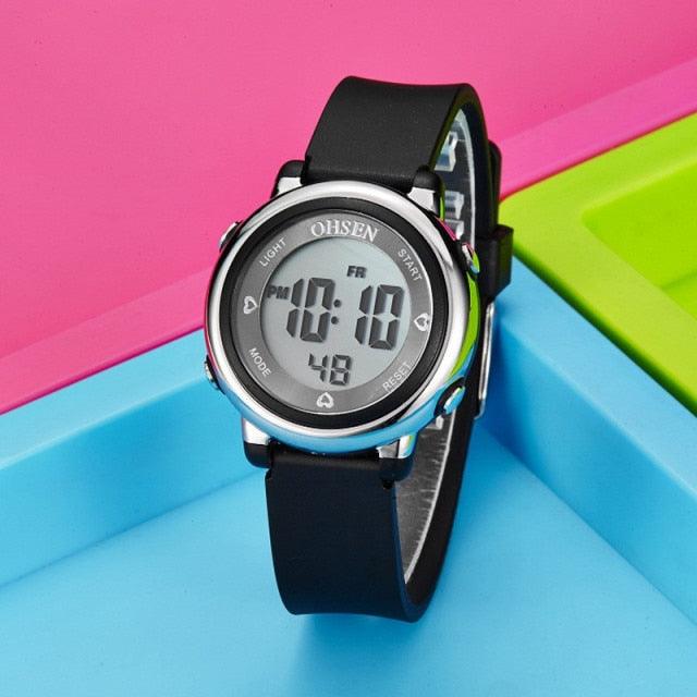 Children Digital LED Fashion Sport Watch Cute Wrist Watch Waterproof Kids Watch Sport Multi Function 50M Waterproof LED Alarm Stopwatch Digital Child Wristwatch For Boy Girl Stevvex