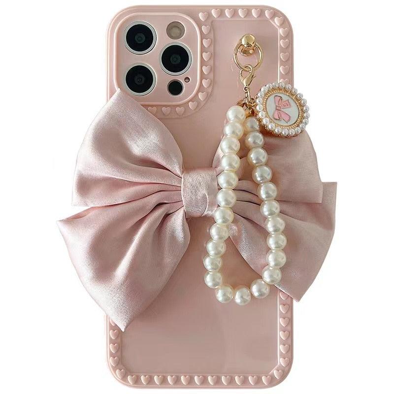 Cute Luxury Fashion 3d Bow Pearl Bracelet Girl Soft Case For iPhone 11 12 13 Pro Max 7 8 Plus Xr X Xs Se Anti-drop Cover Pearl Chain Bow Phone Case Ideal for iPhone Elegant Phone Case Stevvex
