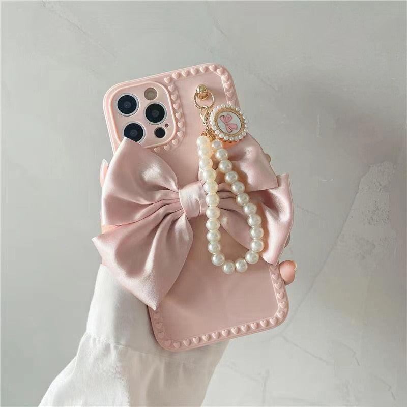 Cute Luxury Fashion 3d Bow Pearl Bracelet Girl Soft Case For iPhone 11 12 13 Pro Max 7 8 Plus Xr X Xs Se Anti-drop Cover Pearl Chain Bow Phone Case Ideal for iPhone Elegant Phone Case Stevvex