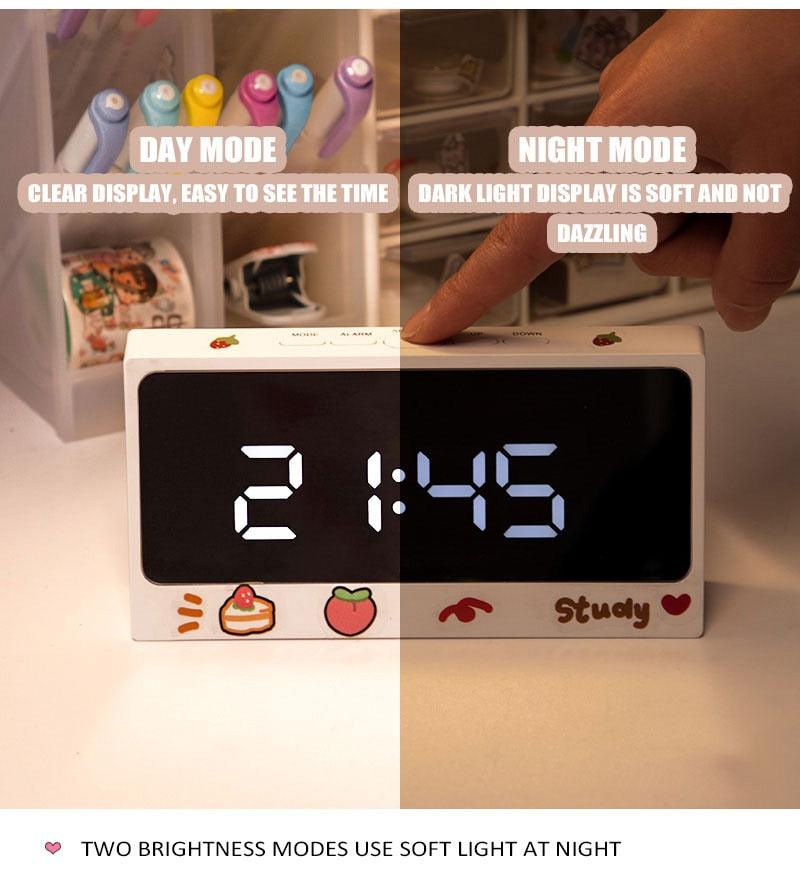 Digital Clock Table Clock Snooze Alarm Cute Silent Mirror Clock Student Desktop Mirror Surface LED Alarm Clock with USB Charger 12/24H Easy Snooze Function Adjustable Brightness Alarm Clocks for Bedroom LED Clock Electronic Clock for Children Stevvex