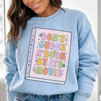 Don't Judge A Book Sweatshirt Peachy Sunday