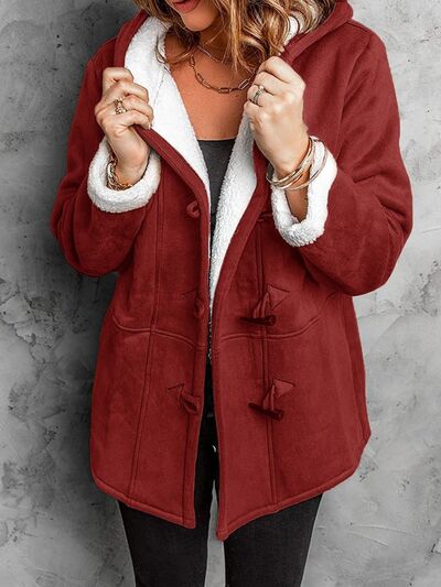 Full Size Pocketed Long Sleeve Hooded Toggle Jacket – Stylish & Functional Outerwear for Women Stevvex