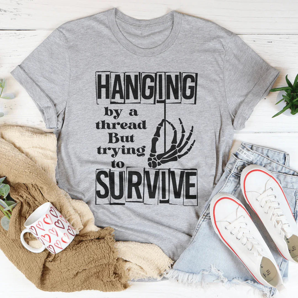Hanging By A Thread But Trying To Survive Tee Peachy Sunday